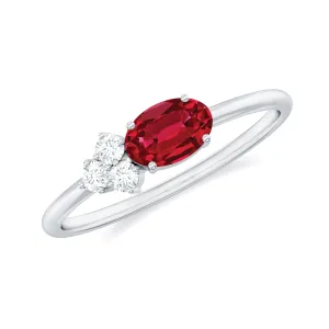 Oval Shape Lab Grown Ruby Ring with Diamond Trio