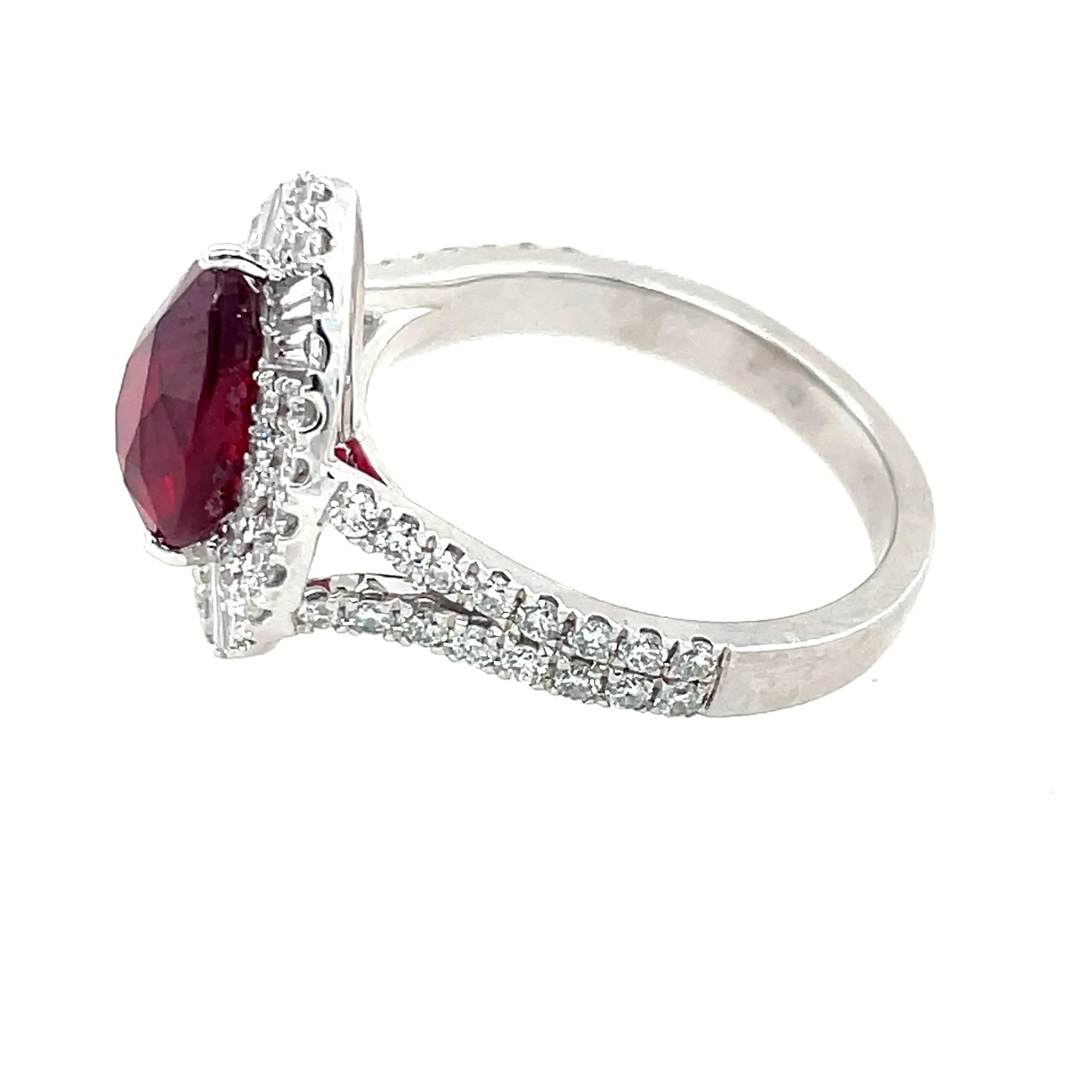 Pear Shape Ruby Halo Diamond Ring