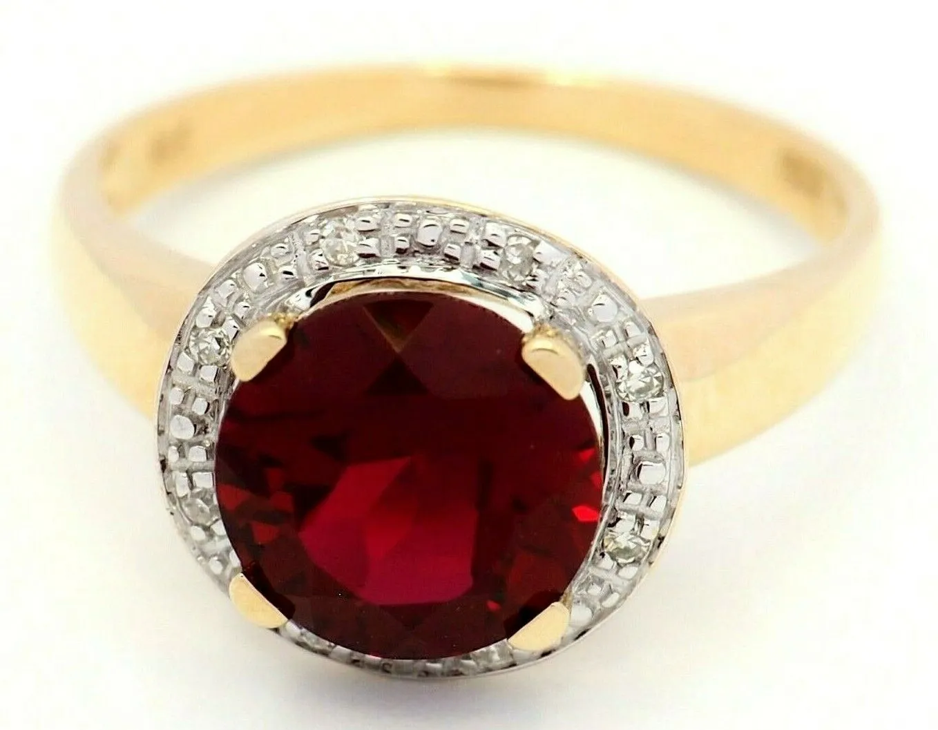 Ruby & Diamond 9ct Yellow Gold & Rhodium Plated Halo Ring