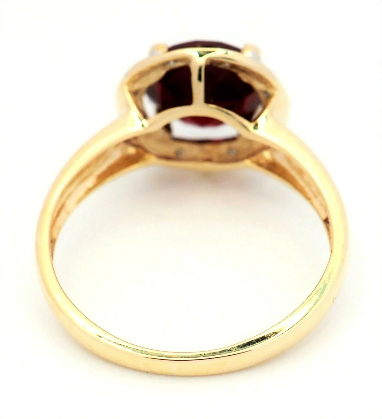 Ruby & Diamond 9ct Yellow Gold & Rhodium Plated Halo Ring