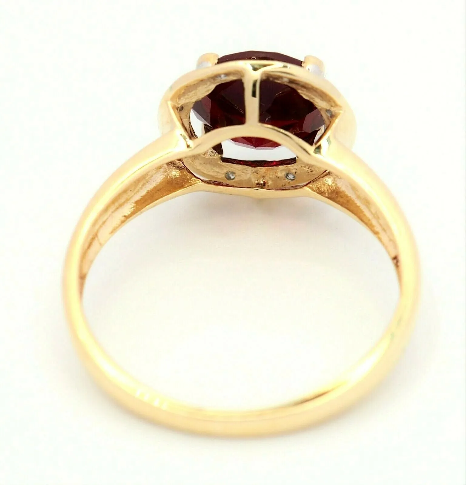 Ruby & Diamond 9ct Yellow Gold & Rhodium Plated Halo Ring