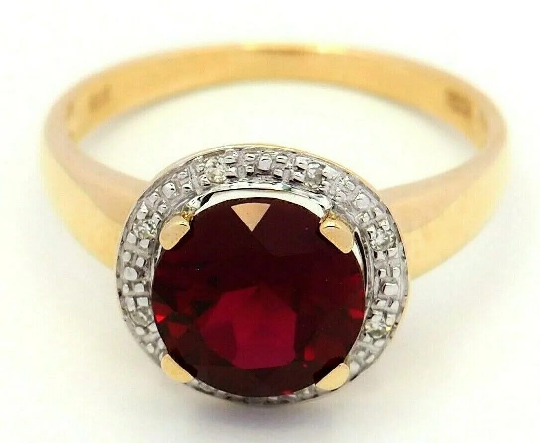 Ruby & Diamond 9ct Yellow Gold & Rhodium Plated Halo Ring